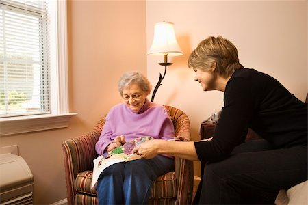 daughter helping elderly parent - Older woman does needlepoint while another woman watches. Horizontal shot. Stock Photo - Budget Royalty-Free & Subscription, Code: 400-04167946