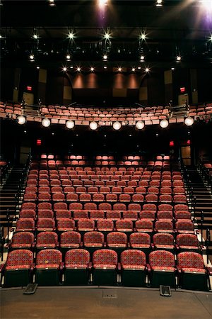 empty theatre chair - Rows of empty seats in theater seen from stage. Vertical shot. Stock Photo - Budget Royalty-Free & Subscription, Code: 400-04167958