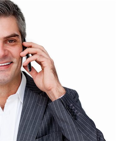 simsearch:400-07820348,k - Close-up of a smiling businessman on phone against a white background Photographie de stock - Aubaine LD & Abonnement, Code: 400-04167994