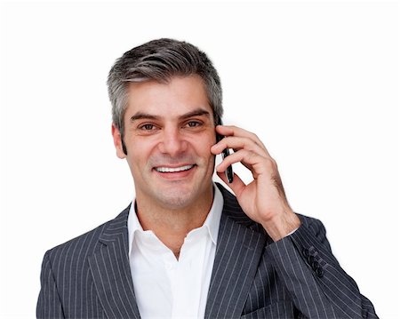 simsearch:400-07820348,k - Assertive male executive on phone against a white background Photographie de stock - Aubaine LD & Abonnement, Code: 400-04167991