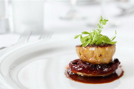 Dinner entree in a gourmet restaurant with sprouts and brown sauce. Horizontal shot. Photographie de stock - Aubaine LD & Abonnement, Code: 400-04168235