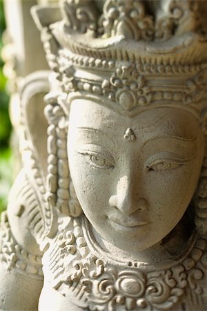 simsearch:400-03944899,k - Carved stone statue of the Buddhist Goddess Kuan Yin. Vertical shot. Stock Photo - Budget Royalty-Free & Subscription, Code: 400-04168302
