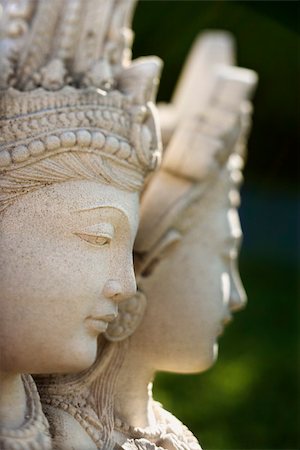 simsearch:400-03944899,k - Carved stone statue of the Buddhist Goddess Kuan Yin. Vertical shot. Stock Photo - Budget Royalty-Free & Subscription, Code: 400-04168303