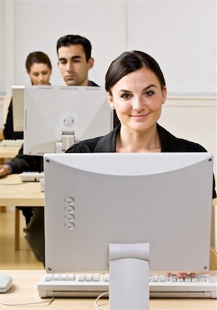 simsearch:400-04132930,k - Businesswoman typing on computer Photographie de stock - Aubaine LD & Abonnement, Code: 400-04168458