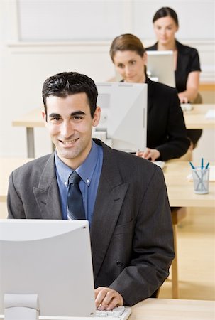 simsearch:400-04129016,k - Business people typing on computer Stock Photo - Budget Royalty-Free & Subscription, Code: 400-04168465