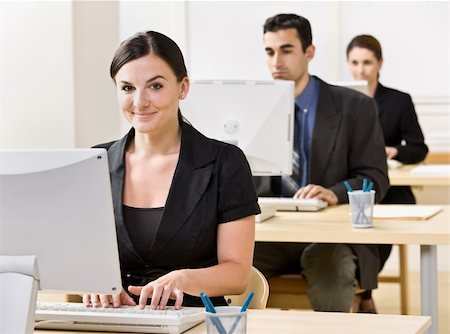 simsearch:400-04129016,k - Businesswoman typing on computer Stock Photo - Budget Royalty-Free & Subscription, Code: 400-04168460