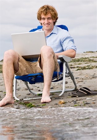 simsearch:400-04168729,k - Man using laptop at beach Stock Photo - Budget Royalty-Free & Subscription, Code: 400-04168665