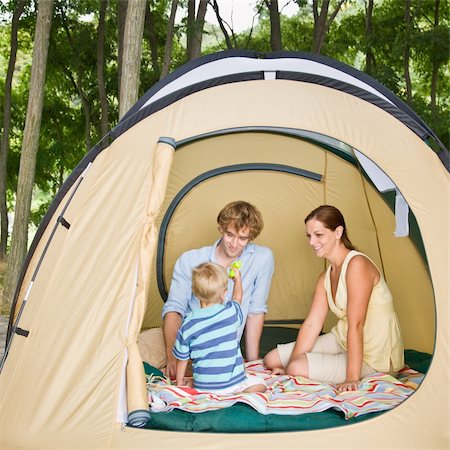 simsearch:400-04168680,k - Family sitting in tent Foto de stock - Super Valor sin royalties y Suscripción, Código: 400-04168686