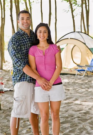 simsearch:400-04168729,k - Couple holding hands at campsite Stock Photo - Budget Royalty-Free & Subscription, Code: 400-04168702
