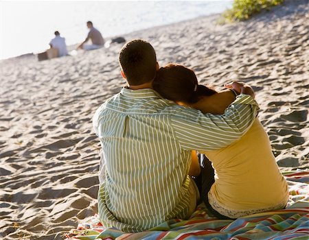 simsearch:400-04168729,k - Couple hugging at beach Stock Photo - Budget Royalty-Free & Subscription, Code: 400-04168736