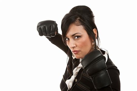 Hispanic businesswoman in dressy jacket and boxing gloves Foto de stock - Super Valor sin royalties y Suscripción, Código: 400-04168774