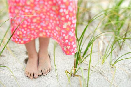 Closeup of a little girl's barefoot feet that are covered in sand. Horizontal shot. Stock Photo - Budget Royalty-Free & Subscription, Code: 400-04168802