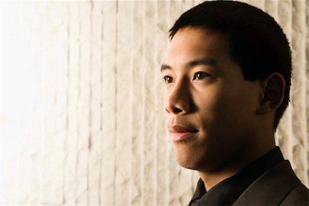 simsearch:400-04167566,k - Close-up profile portrait of Asian young adult businessman. Horizontal format. Stockbilder - Microstock & Abonnement, Bildnummer: 400-04169177