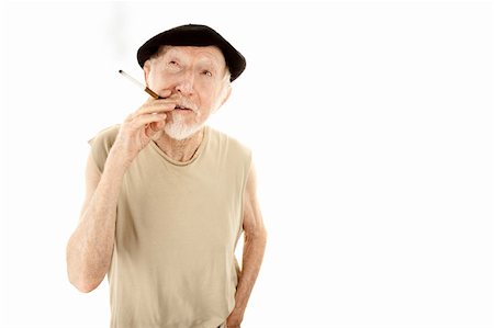 Senior man in black felt beret with cigarette Stock Photo - Budget Royalty-Free & Subscription, Code: 400-04169932