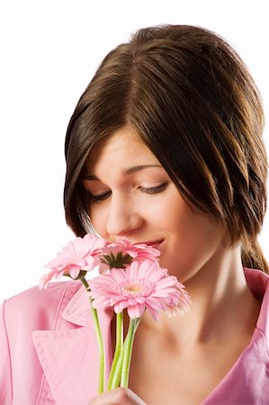 simsearch:400-04667271,k - close up of cute brunette in pink smelling some flowers and making funny face Stock Photo - Budget Royalty-Free & Subscription, Code: 400-04160035