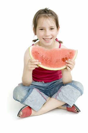 simsearch:400-04979626,k - little girl eating watermelon isolated on white Foto de stock - Super Valor sin royalties y Suscripción, Código: 400-04160075