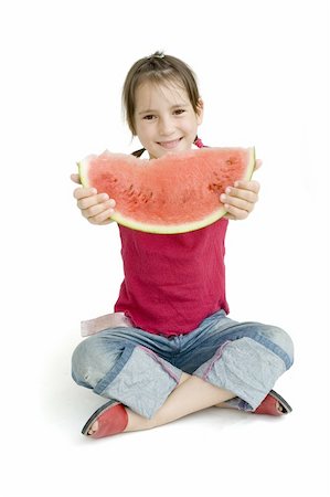 simsearch:400-04979626,k - little girl eating watermelon isolated on white Foto de stock - Super Valor sin royalties y Suscripción, Código: 400-04160076