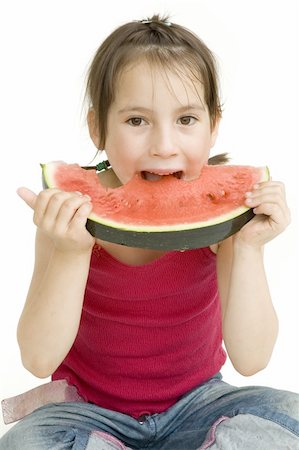 simsearch:400-04979626,k - little girl eating watermelon isolated on white Foto de stock - Super Valor sin royalties y Suscripción, Código: 400-04160077