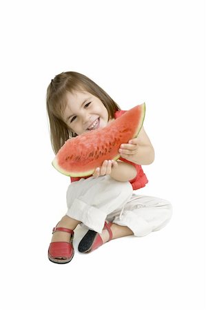 simsearch:400-04979626,k - little girl eating watermelon isolated on white Foto de stock - Super Valor sin royalties y Suscripción, Código: 400-04160073