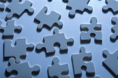 Backlit jigsaw puzzle pieces at randow as a nice background Stock Photo - Budget Royalty-Free & Subscription, Code: 400-04160629