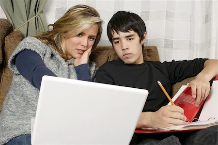 study online at home - Two students and friends doing their homework using their laptop. Stock Photo - Budget Royalty-Free & Subscription, Code: 400-04161187