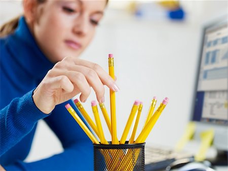 cropped view of business woman arranging pencils in office. Stock Photo - Budget Royalty-Free & Subscription, Code: 400-04162161