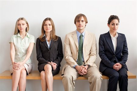 simsearch:400-04167566,k - Four businesspersons sitting on bench. Horizontally framed shot. Stockbilder - Microstock & Abonnement, Bildnummer: 400-04162668