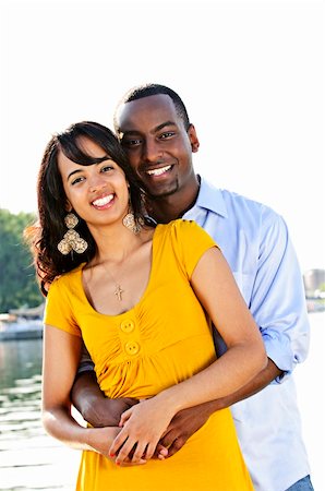 Young romantic couple hugging and standing at harbor Stock Photo - Budget Royalty-Free & Subscription, Code: 400-04162791