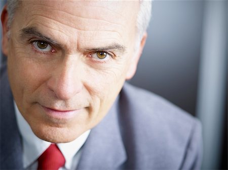 simsearch:400-03972352,k - closeup of mature business man looking at camera. Copy space Stock Photo - Budget Royalty-Free & Subscription, Code: 400-04163638