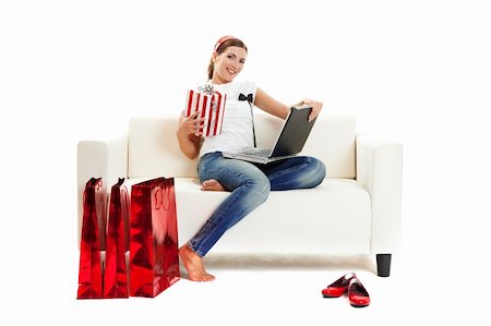 Beautiful young woman at home doing online shop, Consumerism concept Stock Photo - Budget Royalty-Free & Subscription, Code: 400-04174034