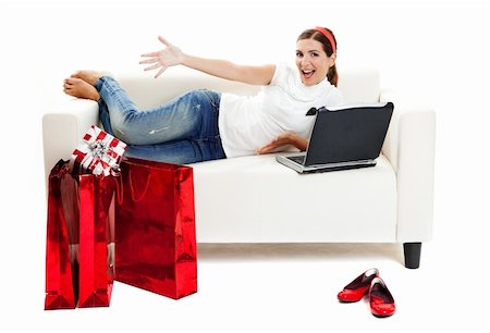 Beautiful young woman at home doing online shop, Consumerism concept Stock Photo - Budget Royalty-Free & Subscription, Code: 400-04174035