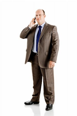 simsearch:400-05718346,k - Middle-aged businessman making a phone call, isolated on white background Foto de stock - Super Valor sin royalties y Suscripción, Código: 400-04174040