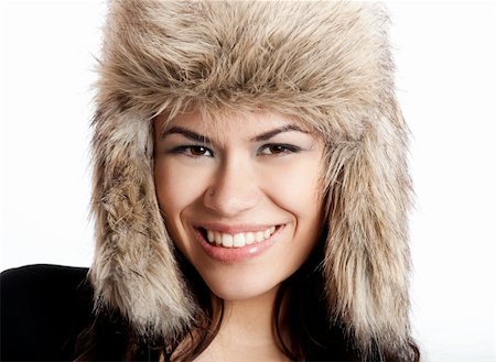 simsearch:400-06105120,k - Adorable young woman with a beautiful smile and wearing a hat Fotografie stock - Microstock e Abbonamento, Codice: 400-04174075