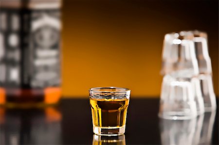 distillation - Shot of whiskey on a bar with bottle Stock Photo - Budget Royalty-Free & Subscription, Code: 400-04174149