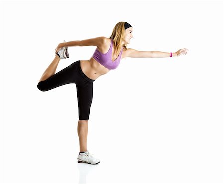 simsearch:400-04345817,k - Beautiful young woman doing fitness exercises, isolate on white Stockbilder - Microstock & Abonnement, Bildnummer: 400-04174770