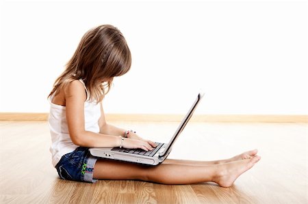 pictures of kids and friends playing at school - Little child learning how to use a laptop Stock Photo - Budget Royalty-Free & Subscription, Code: 400-04174836