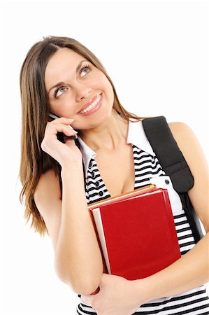 simsearch:400-04854970,k - beautiful girl with a backpack, holds the book, on a white background Stock Photo - Budget Royalty-Free & Subscription, Code: 400-04174871