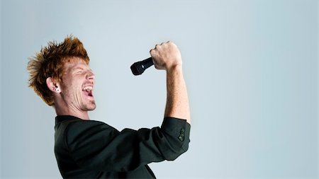 Super rock star lead singer belts out a high note Stock Photo - Budget Royalty-Free & Subscription, Code: 400-04175895