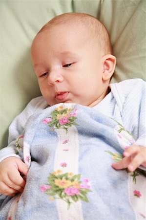 Portrait of adorable baby lying in bed Photographie de stock - Aubaine LD & Abonnement, Code: 400-04176136