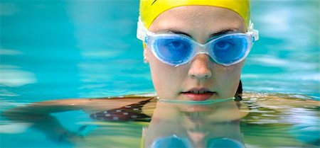 Swimmer looks towards camera while in the water Stock Photo - Budget Royalty-Free & Subscription, Code: 400-04176359