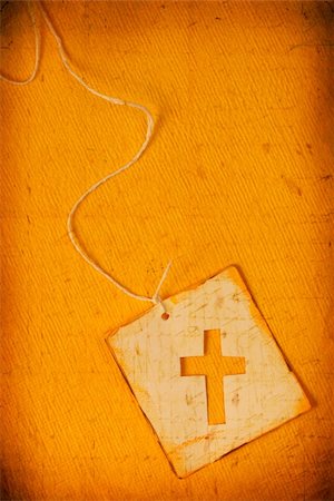 simsearch:400-06087640,k - Close up of handmade paper tag with holy cross Stock Photo - Budget Royalty-Free & Subscription, Code: 400-04178075