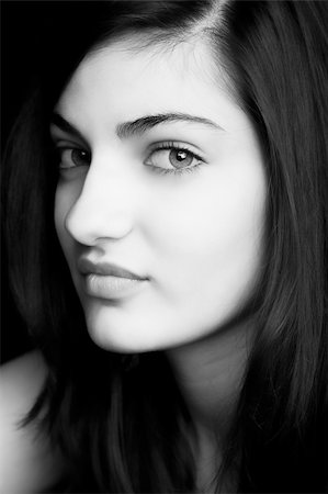 Close-up Portrait of a beautiful young woman. Studio shot. Stock Photo - Budget Royalty-Free & Subscription, Code: 400-04178177