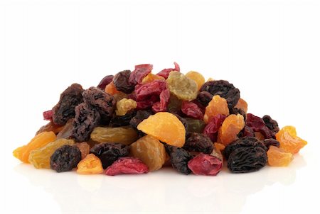 simsearch:400-07510855,k - Healthy fruit and berry snack food mixture isolated over white  background. Photographie de stock - Aubaine LD & Abonnement, Code: 400-04178526