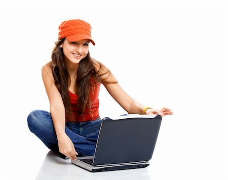 Beautiful young female student with a laptop, isolated on white Stock Photo - Budget Royalty-Free & Subscription, Code: 400-04178636