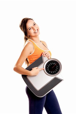 Portrait of a beautiful athletic girl holding a scale, isolated on white Stock Photo - Budget Royalty-Free & Subscription, Code: 400-04178670