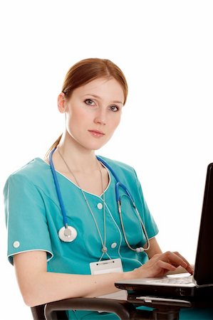 simsearch:400-04704005,k - The young medical nurse with the laptop. Stock Photo - Budget Royalty-Free & Subscription, Code: 400-04178933