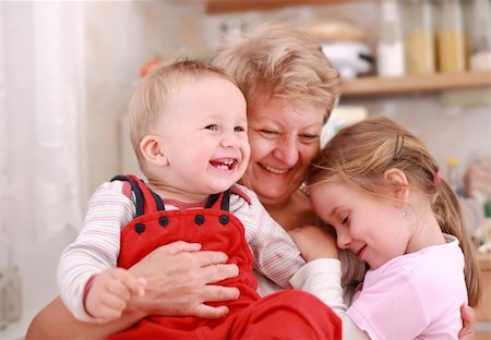 simsearch:400-04162652,k - Cute little boy and little girl happy with grandmother Stockbilder - Microstock & Abonnement, Bildnummer: 400-04179123