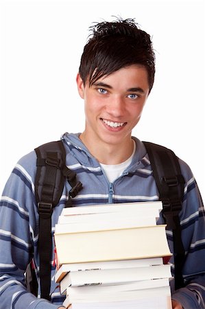 simsearch:6107-06117700,k - Young student holding books and smiles happy into camera. Isolated on white. Photographie de stock - Aubaine LD & Abonnement, Code: 400-04179763