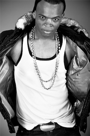 Young stylish black man dancing closeup on indoor studio Stock Photo - Budget Royalty-Free & Subscription, Code: 400-04171475