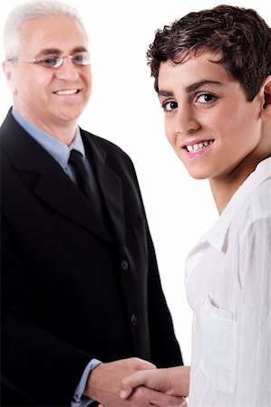 simsearch:400-04171780,k - Business man handshake with a young boy on isolated white background Stock Photo - Budget Royalty-Free & Subscription, Code: 400-04171784